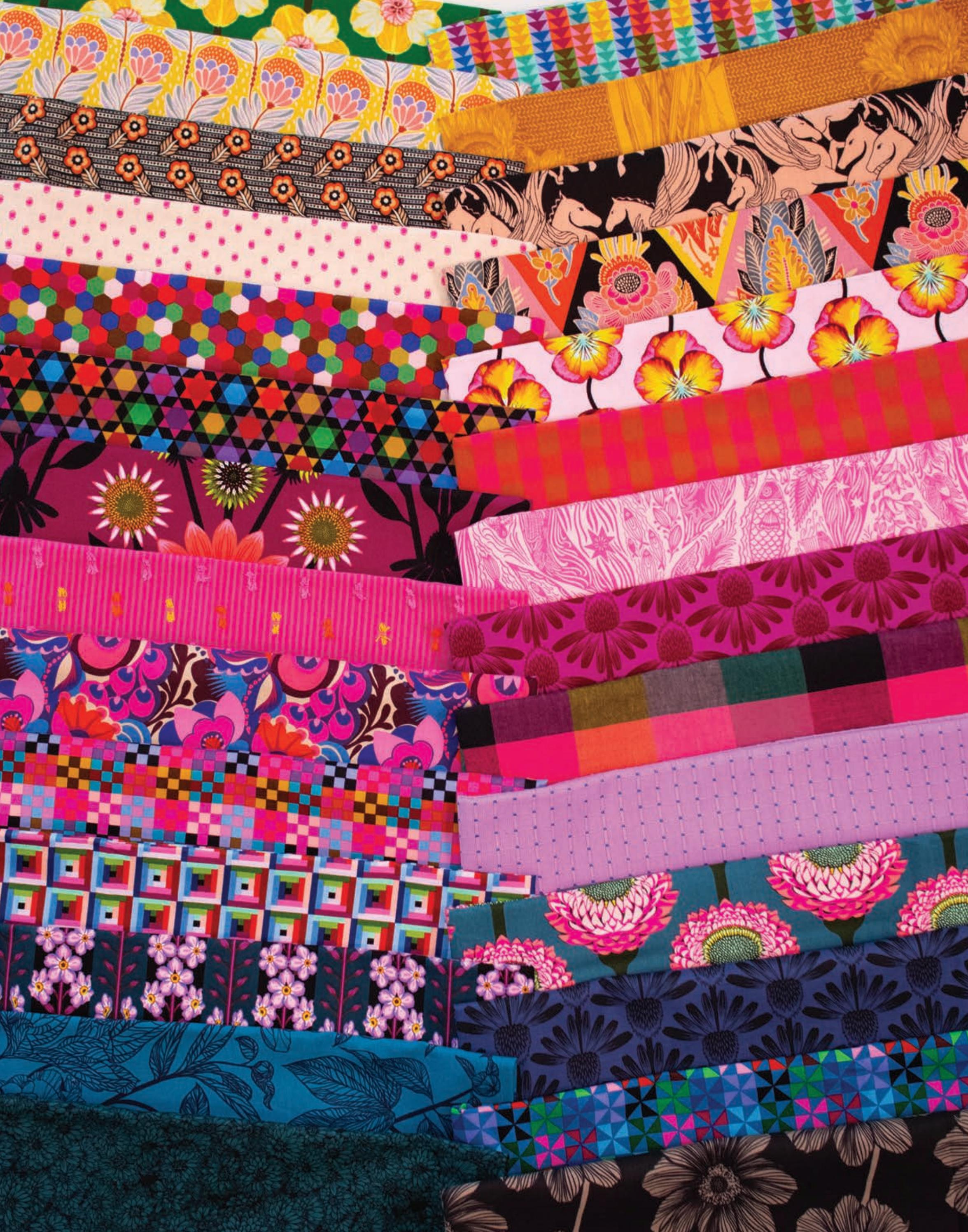 The image is a vibrant collage of various colorful fabric patterns and designs, creating a visually striking and diverse display.