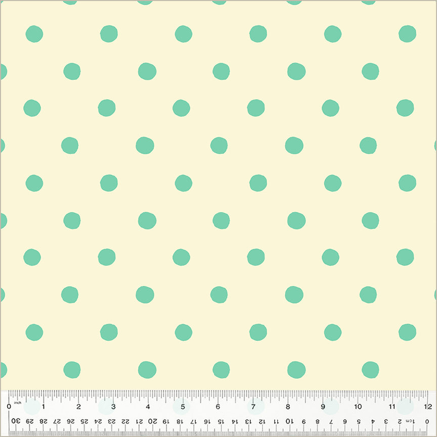 a repeating pattern of green polka dots on a light beige background.