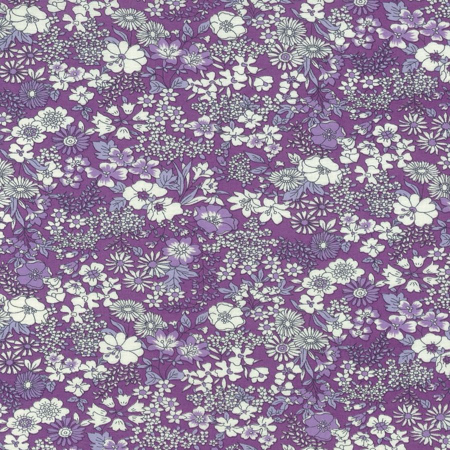 The image is a collage of various flowers in shades of purple and white, creating a visually appealing and vibrant pattern.