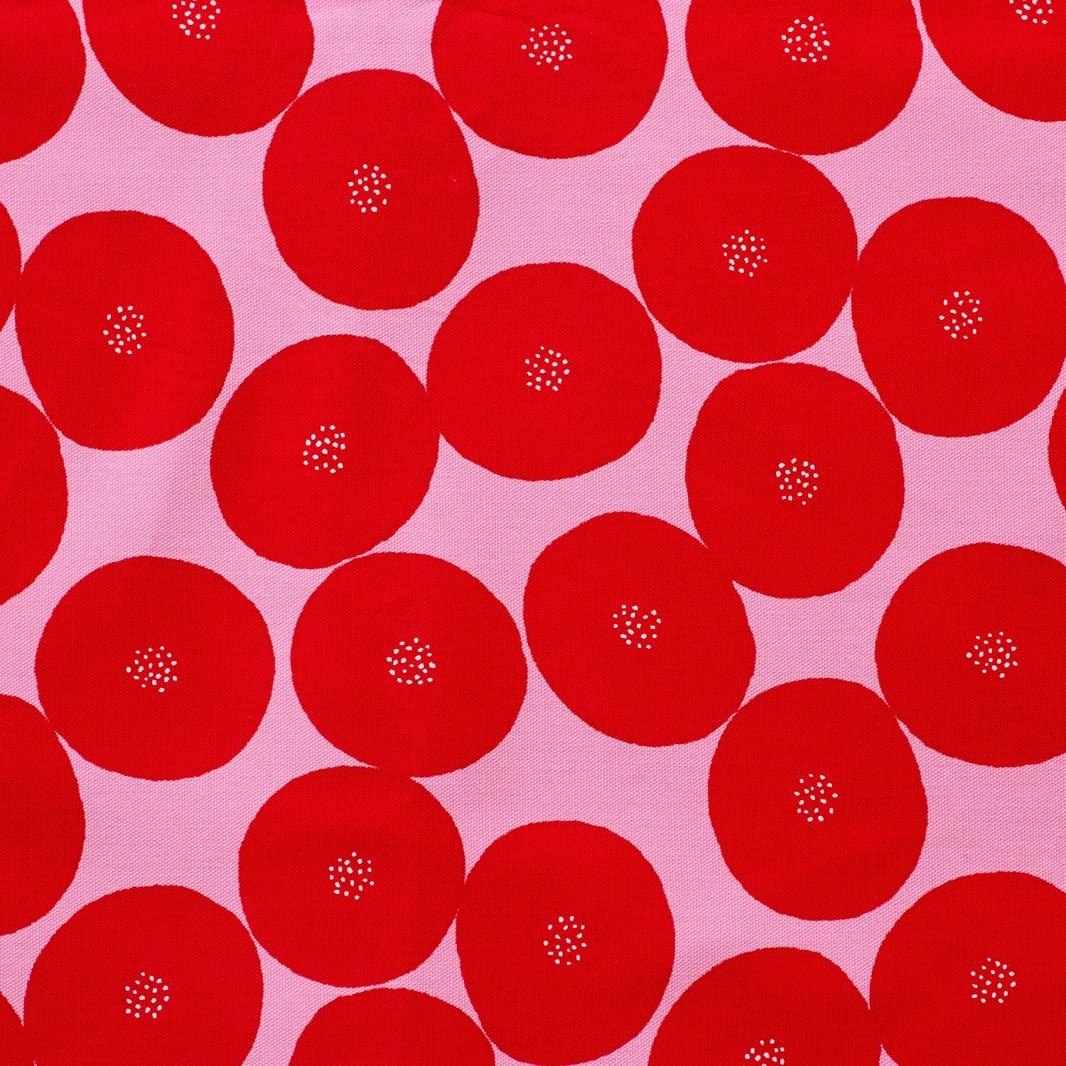 a repeating pattern of red circles with white centers, creating a visually striking and vibrant design.