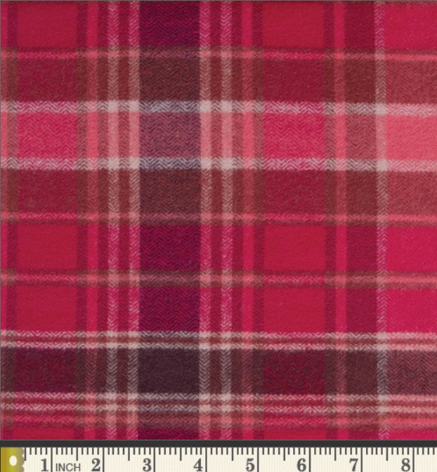 a close-up view of a fabric with a plaid pattern in shades of red and pink. The fabric appears to be made of a woven material, possibly cotton or wool. The image does not contain any text or other objects, and the focus is solely on the fabric's color and texture.