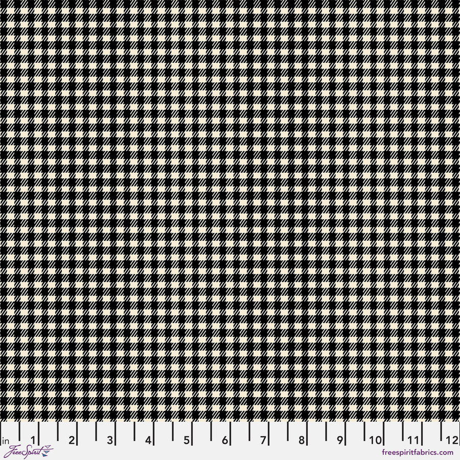 The image is a close-up of a fabric with a black and white checkered pattern.