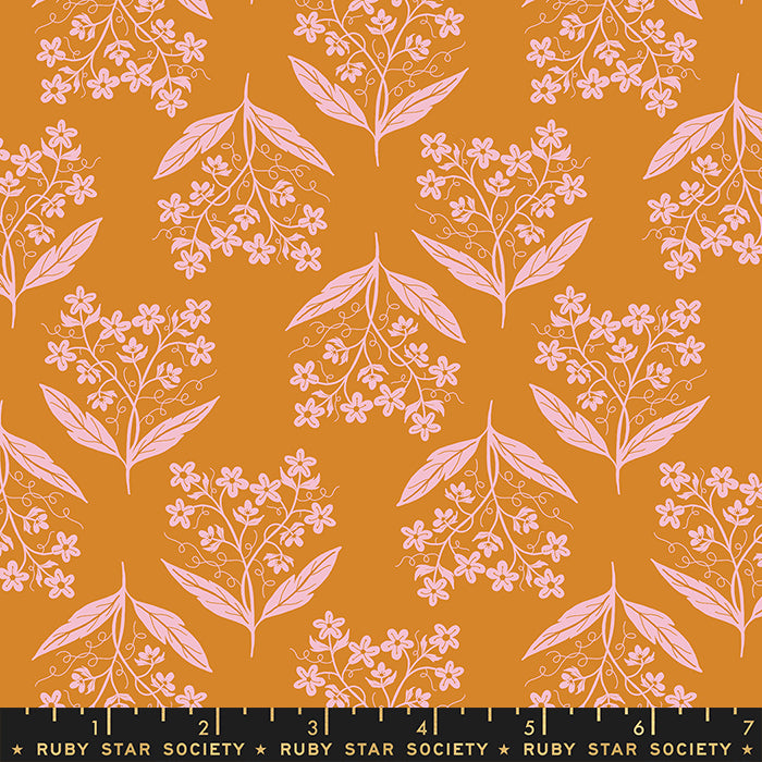 an orange background with pink flowers and leaves