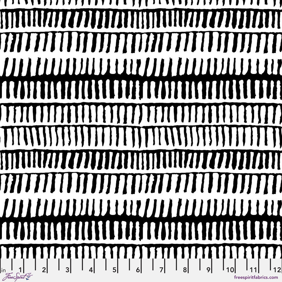 The image is a black and white striped pattern with a ruler for scale.