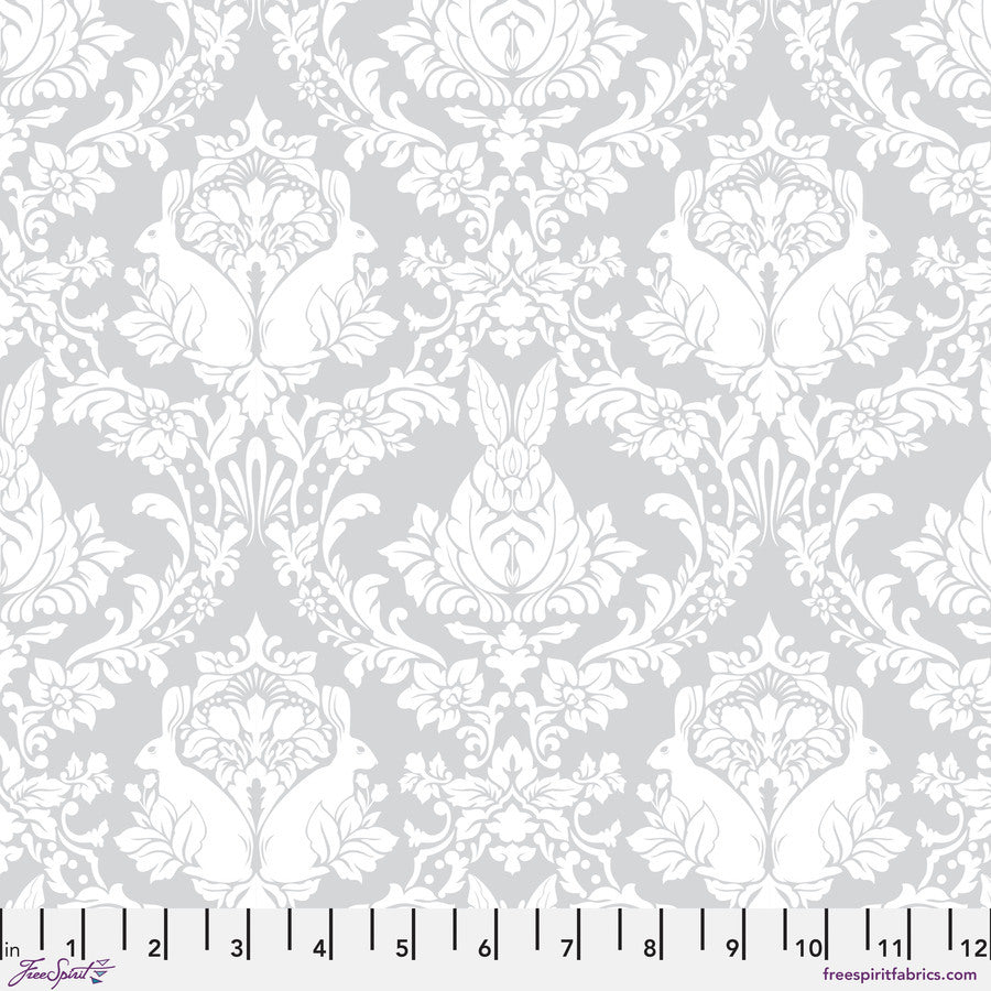 a white and gray wallpaper with a floral design