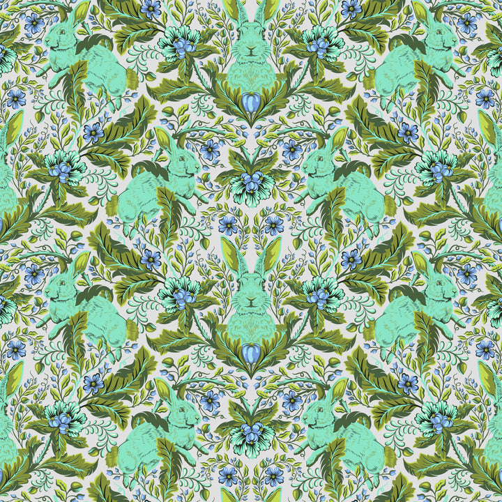 a green and blue floral pattern on a white background