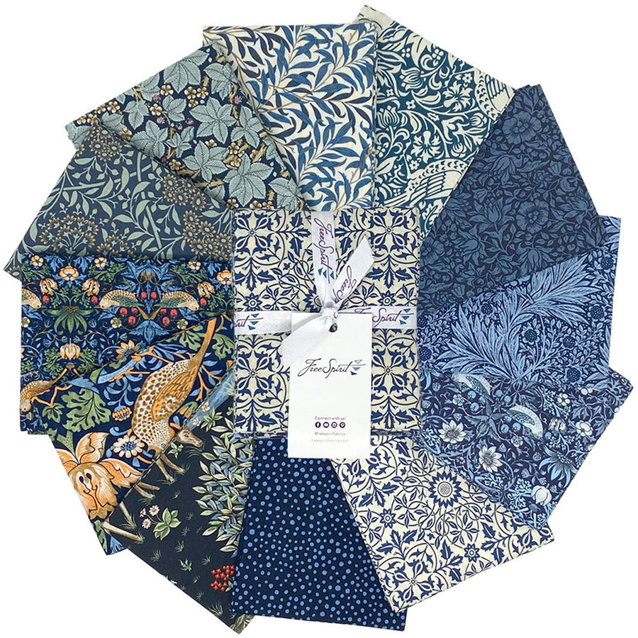 a circular arrangement of various fabric swatches with different patterns and colors, including blue, green, and white floral designs.