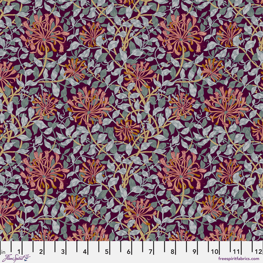 a ruler with a purple and red floral pattern on it
