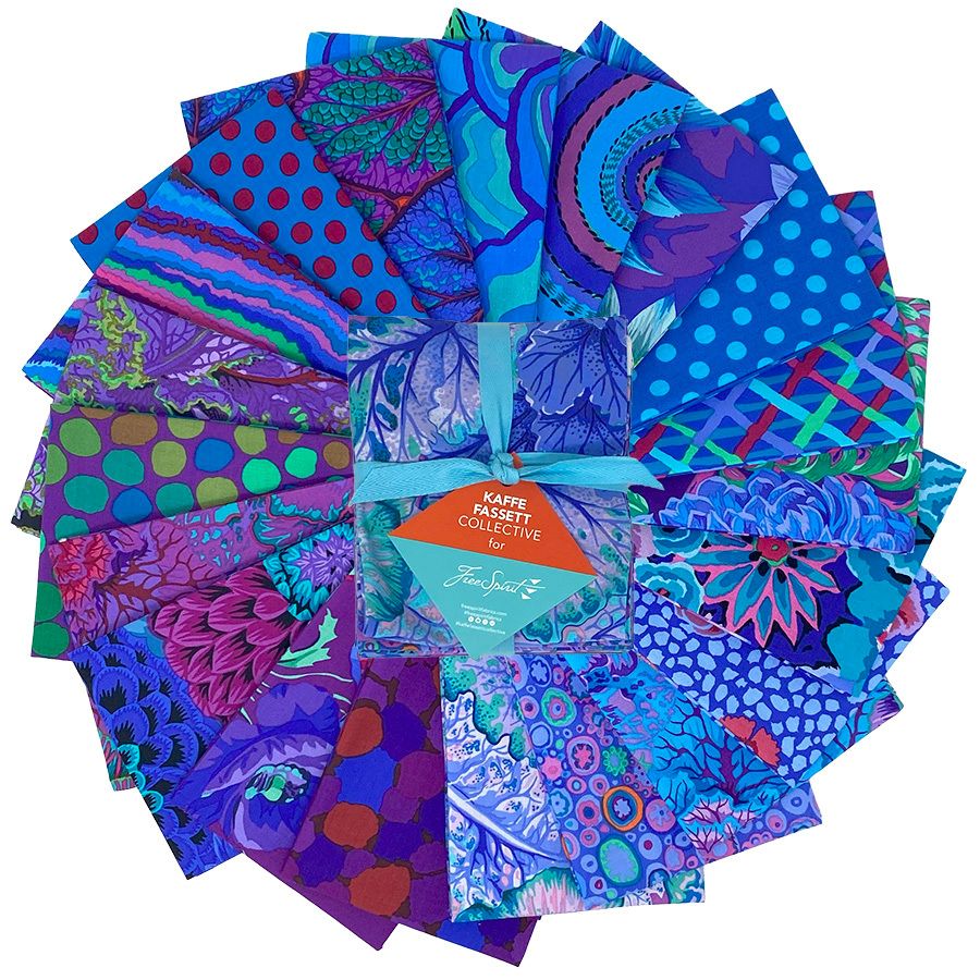 a circular arrangement of various colorful fabric pieces, including polka dots, stripes, and floral patterns, all set against a white background.