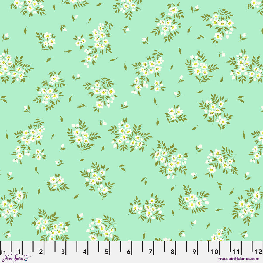 a green background with white flowers and green leaves