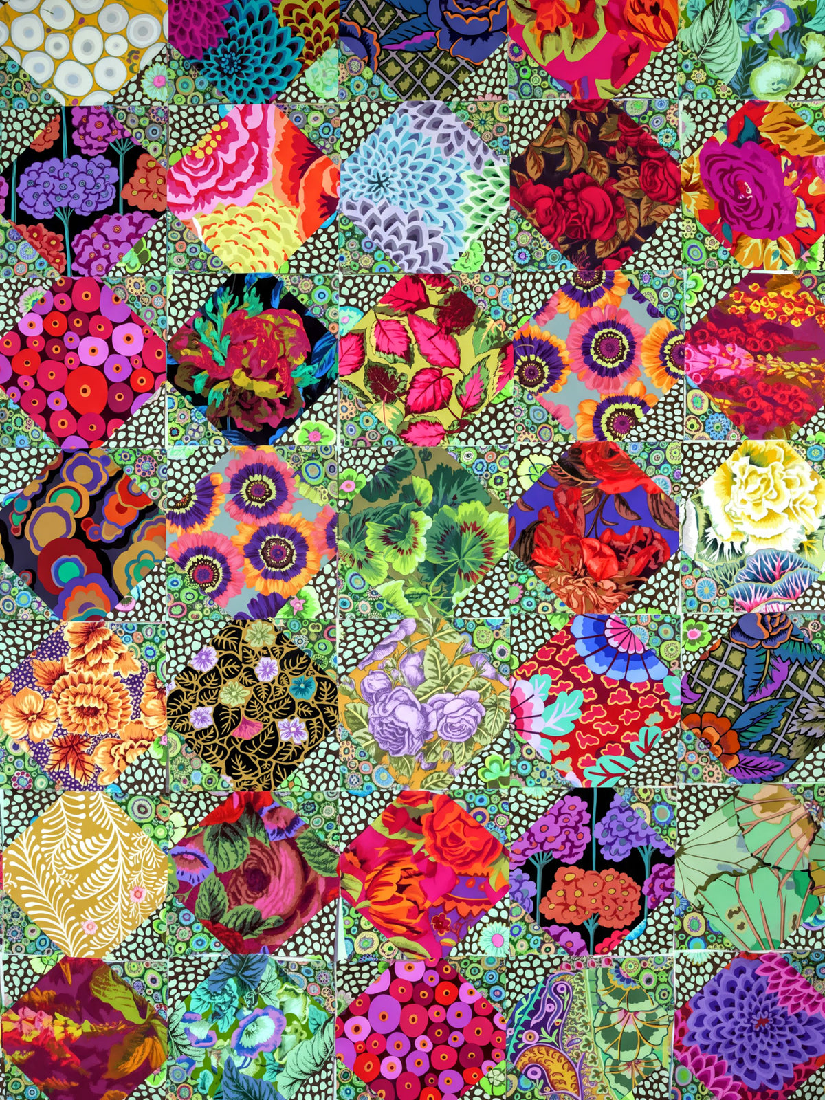 The image is a vibrant collage of various colorful and intricate floral patterns, including roses, leaves, and other natural elements. The patterns are arranged in a grid-like fashion, creating a visually striking and diverse display.