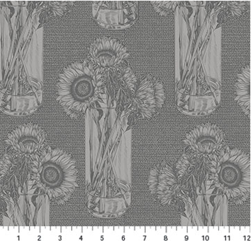a vase of sunflowers on a black and white background