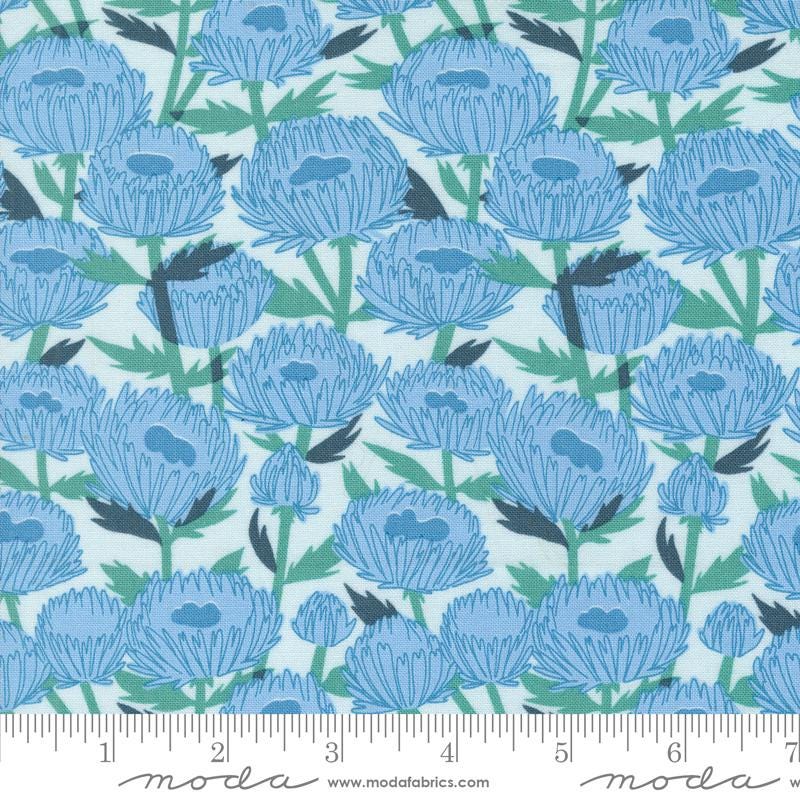 a blue flower pattern on a white background