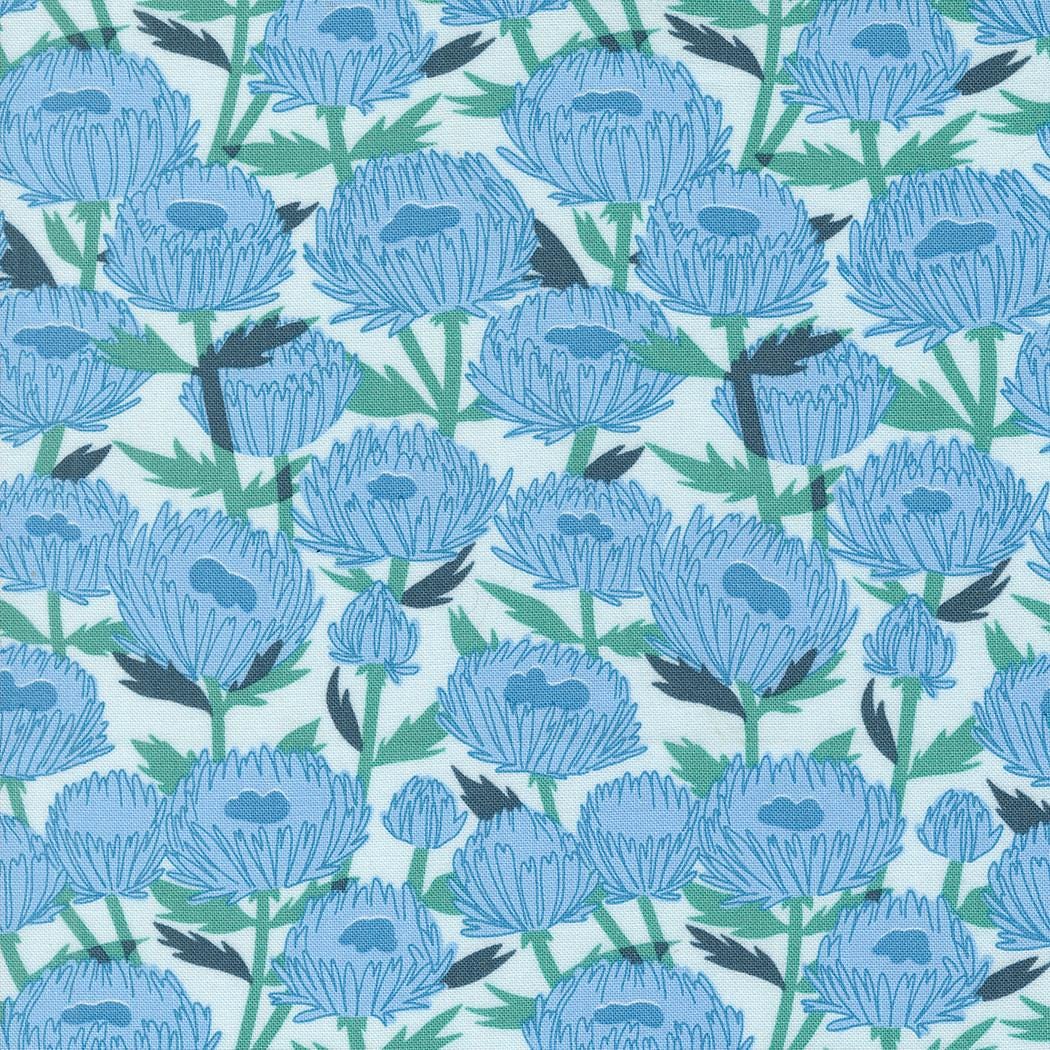 a pattern of blue flowers on a white background