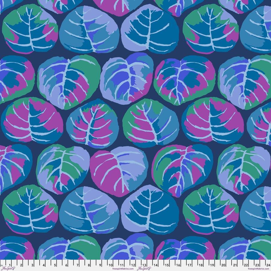 a blue and purple pattern with leaves on it