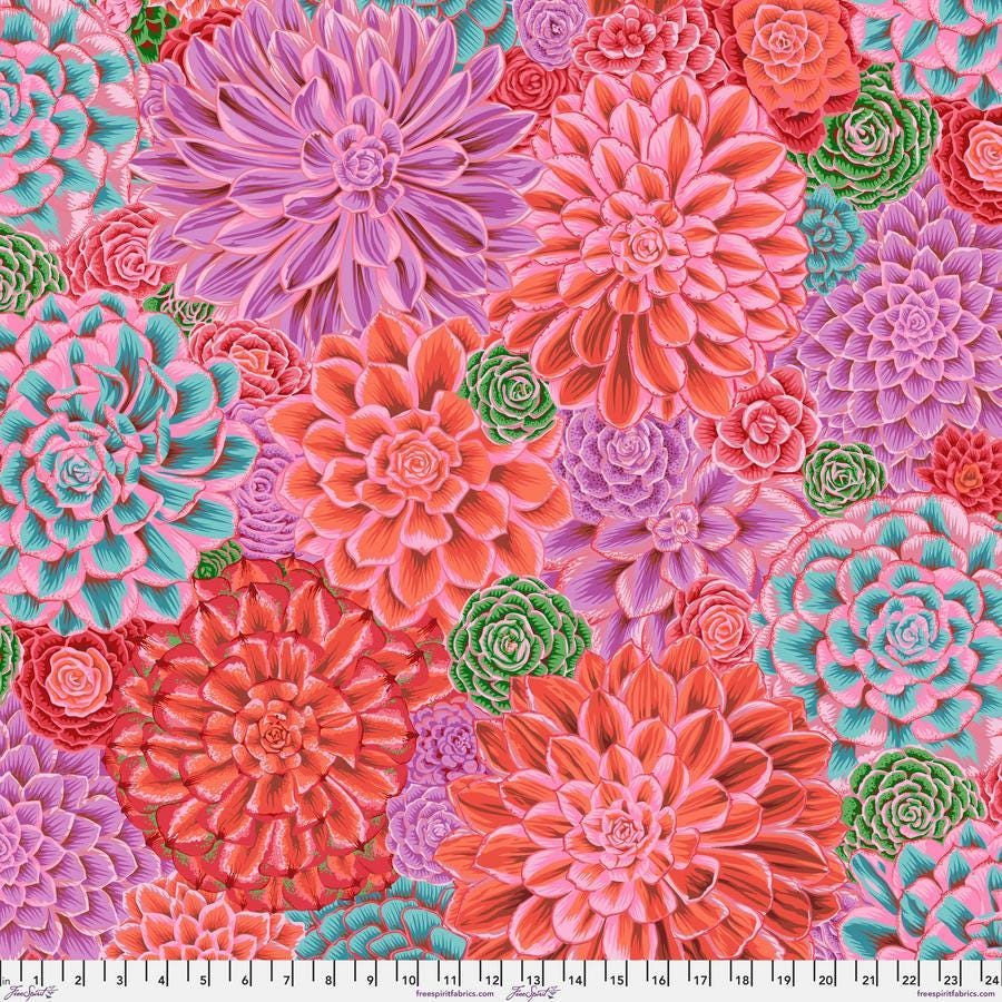 a large group of flowers on a pink background