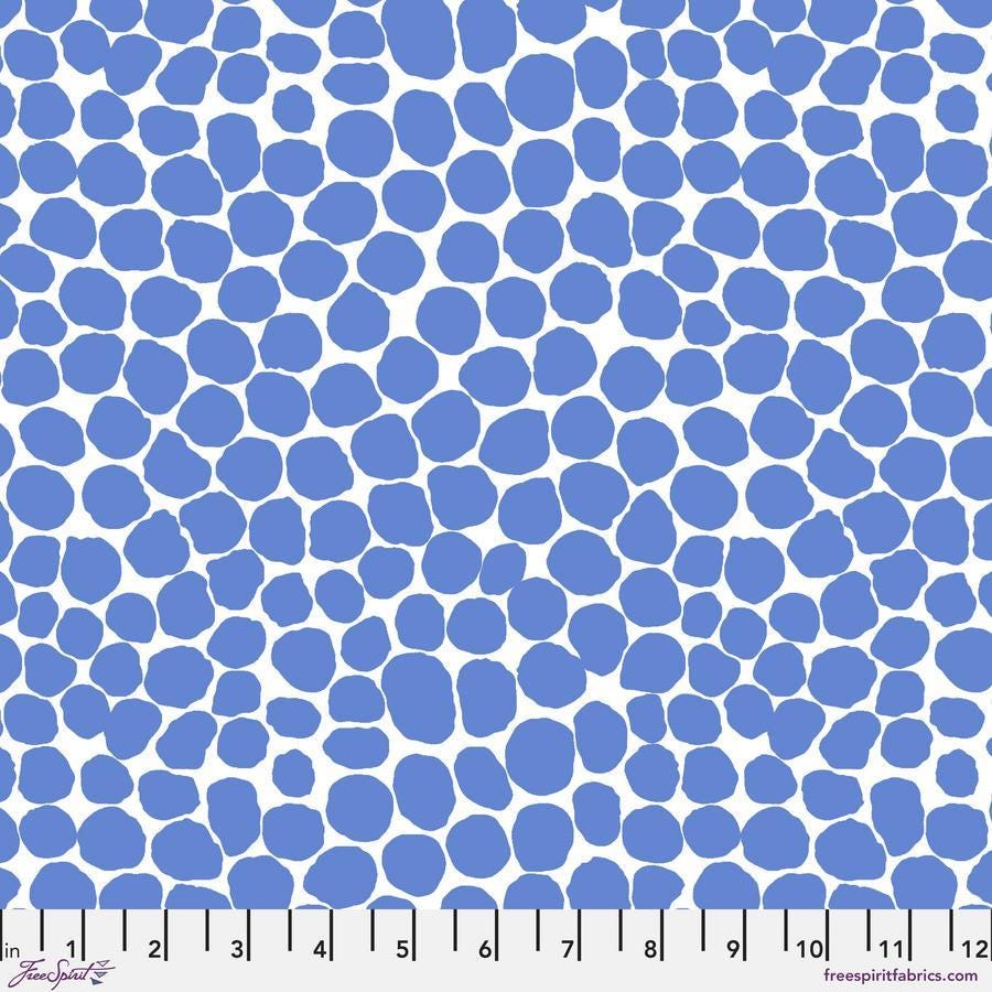 a ruler with a blue and white pattern on it