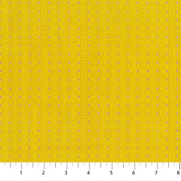 The image is a close-up of a yellow fabric with a grid-like pattern of small dots or squares.