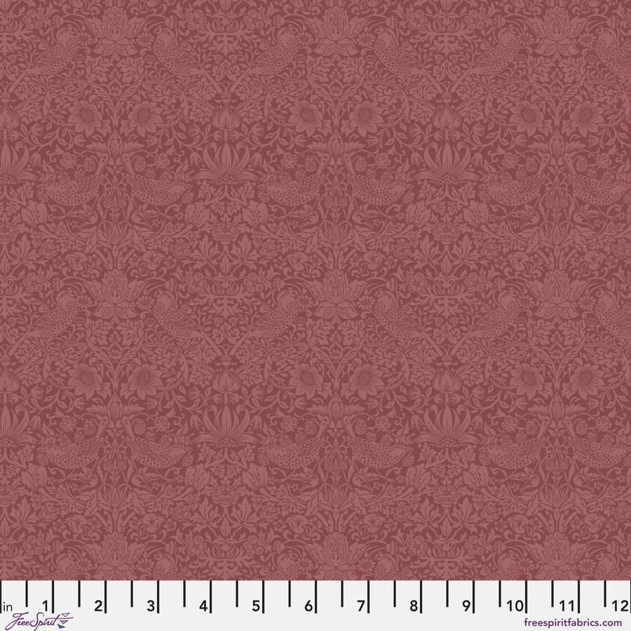 The image is a repeating pattern of a floral design in shades of burgundy.