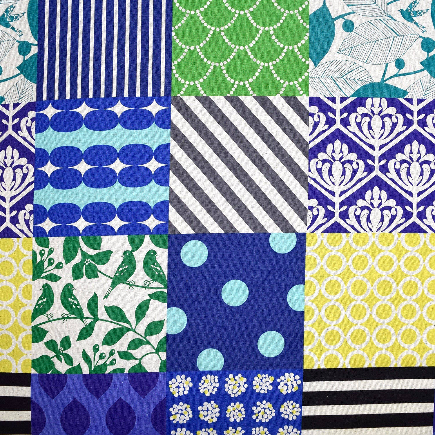 The image is a collage of various colorful and patterned fabric squares, showcasing a diverse range of designs and textures.