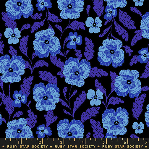 a repeating pattern of blue flowers against a black background.