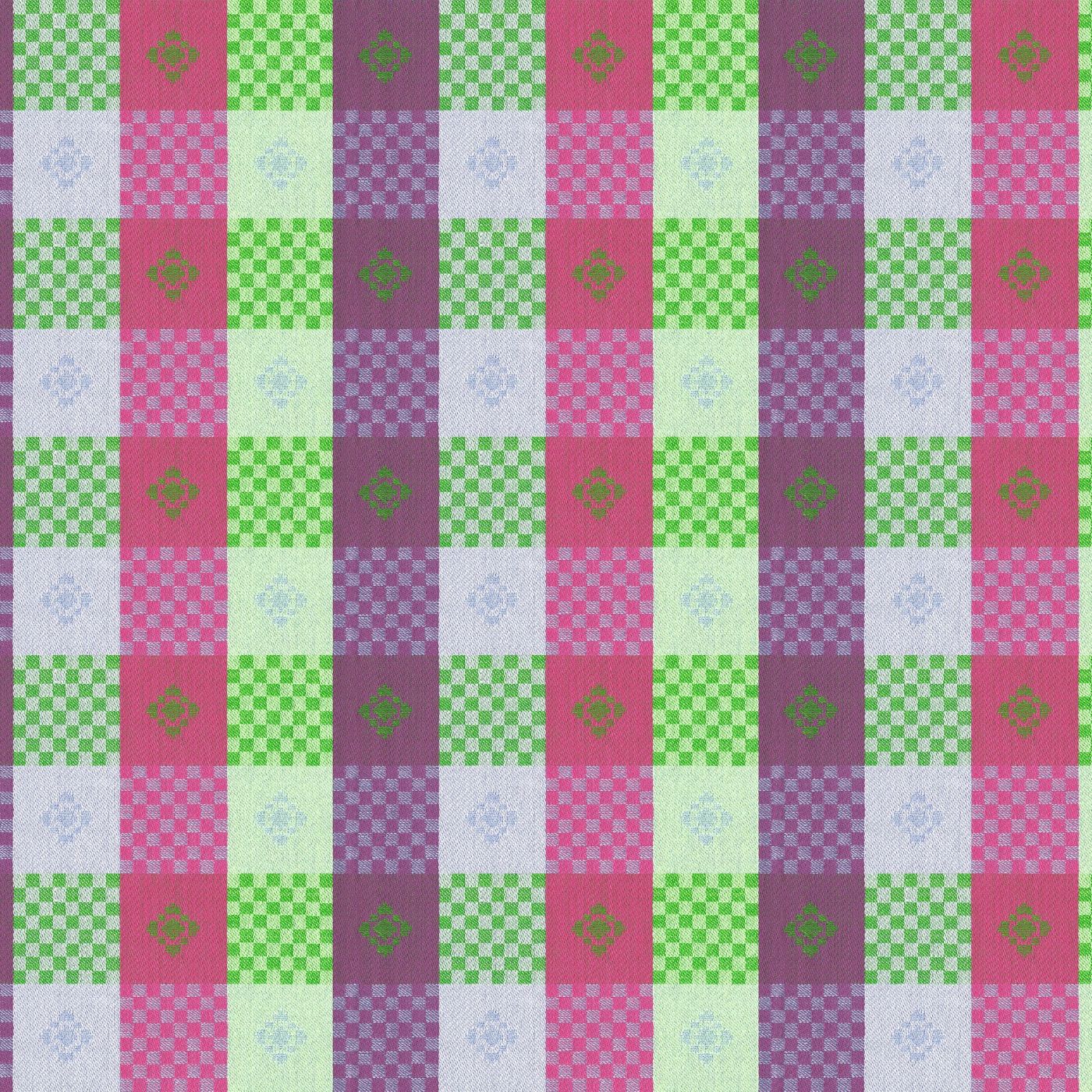 a repeating pattern of squares in various colors, including pink, green, purple, and white, arranged in a grid-like fashion.