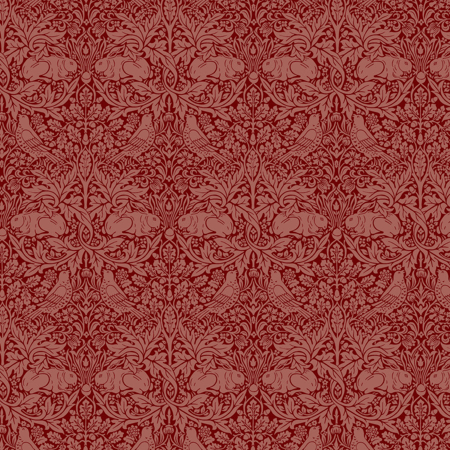 a repeating pattern of stylized floral and bird designs in a rich red color.