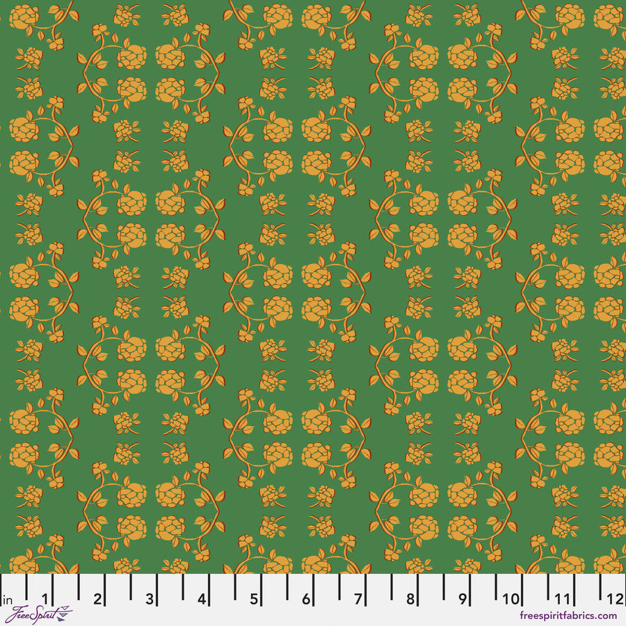 The image is a repeating pattern of yellow flowers on a green background, with a ruler at the bottom indicating the size of the pattern.