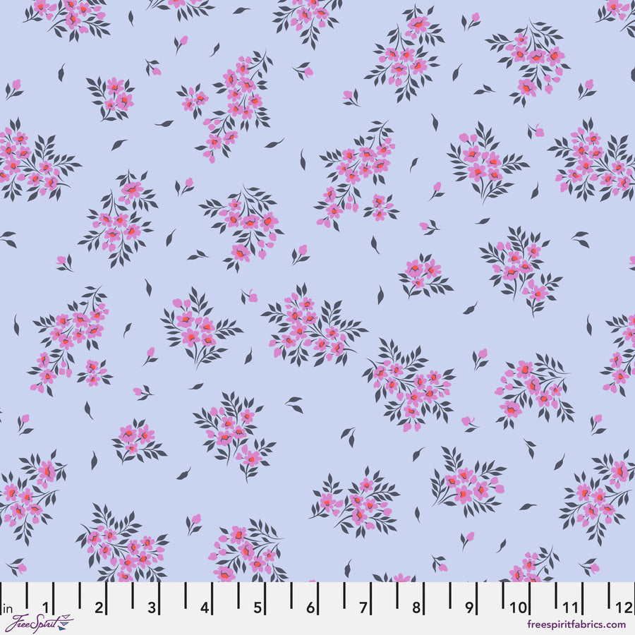 a blue background with pink flowers and leaves