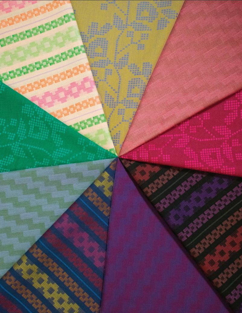 The image is a vibrant collage of nine fabric swatches, each with a unique pattern and color, arranged in a radial pattern.