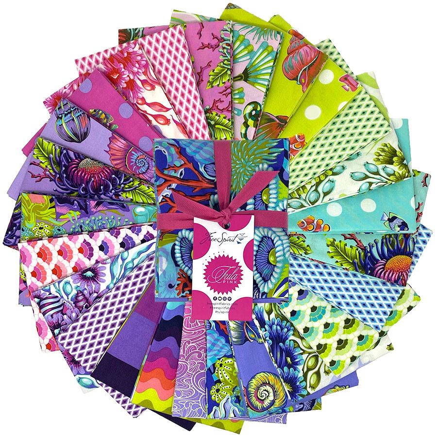 a vibrant collection of fabric swatches, each with a unique pattern and color, arranged in a circular fashion.