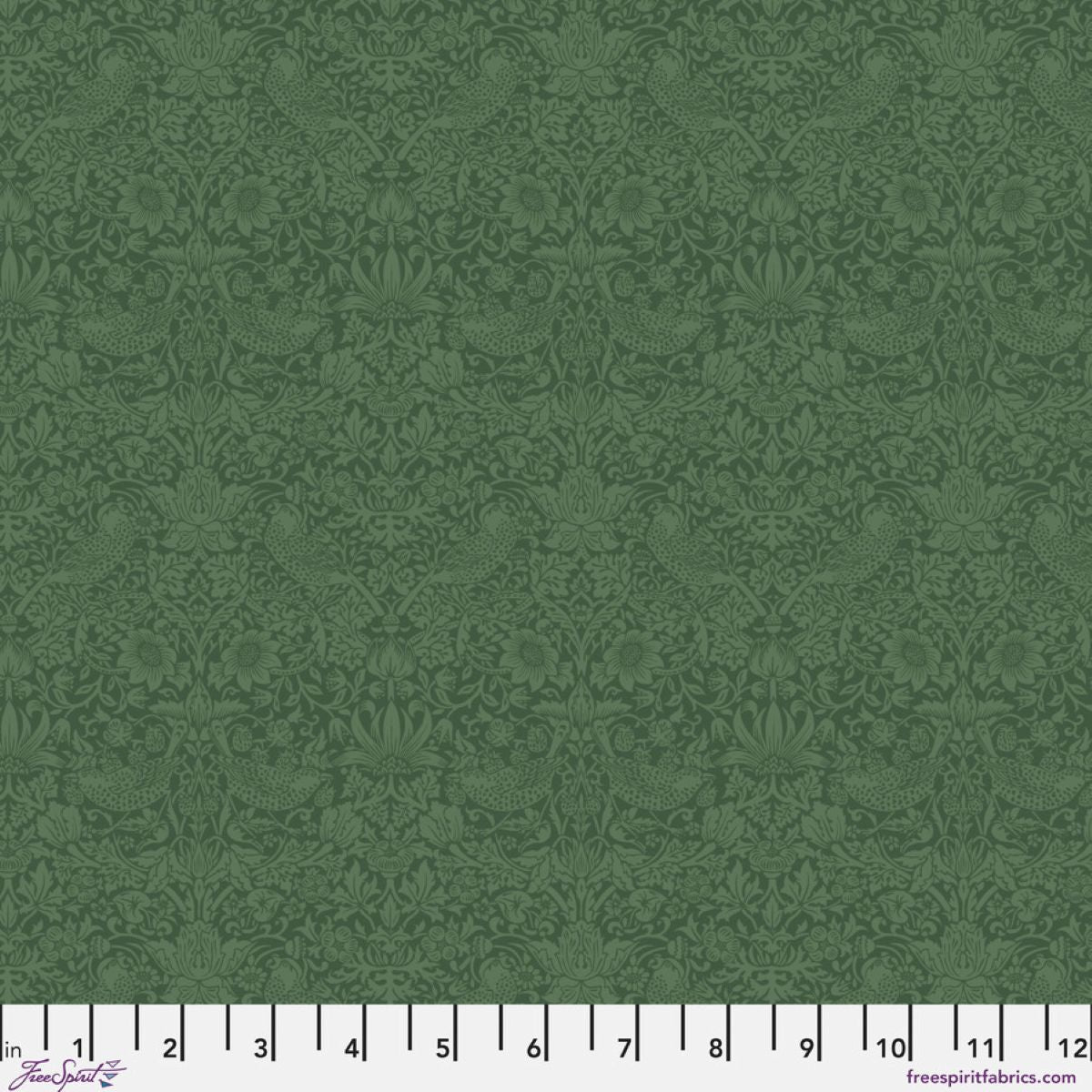 The image is a repeating pattern of green floral designs, with a ruler at the bottom indicating the size of the pattern in inches.