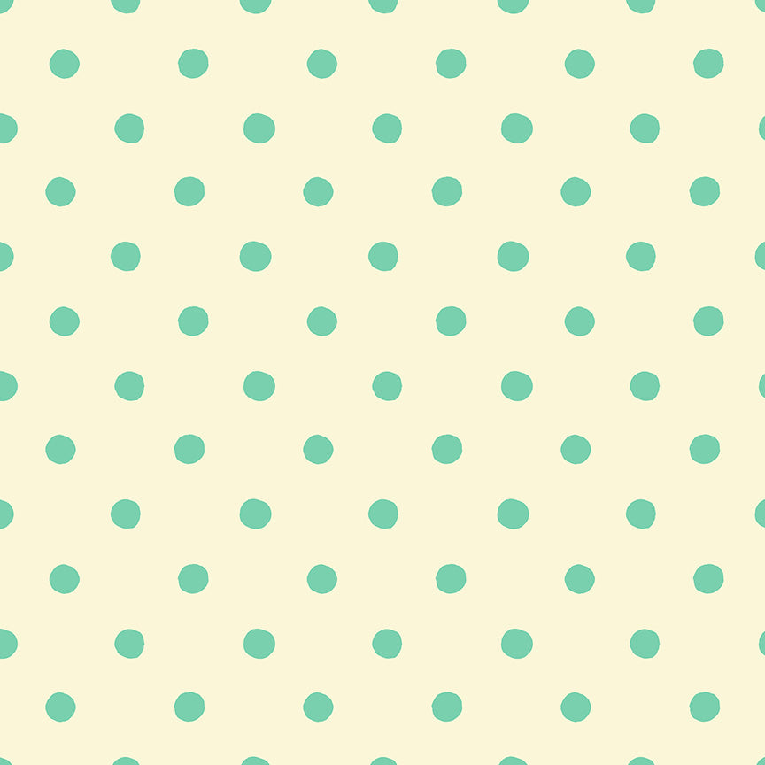 a repeating pattern of green polka dots on a light yellow background.