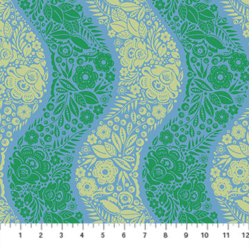 The image is a vibrant and colorful fabric with a repeating pattern of green and yellow flowers and leaves. The pattern is composed of various shapes and sizes of flowers and leaves, creating a visually striking and intricate design.