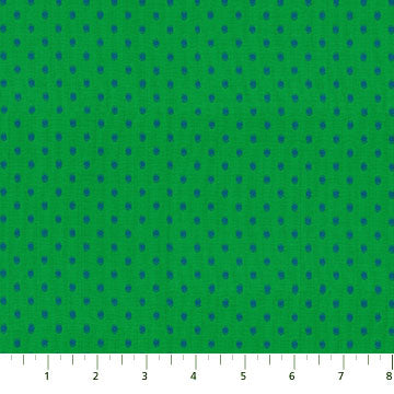 a close-up view of a fabric with a pattern of green dots on a dark green background.