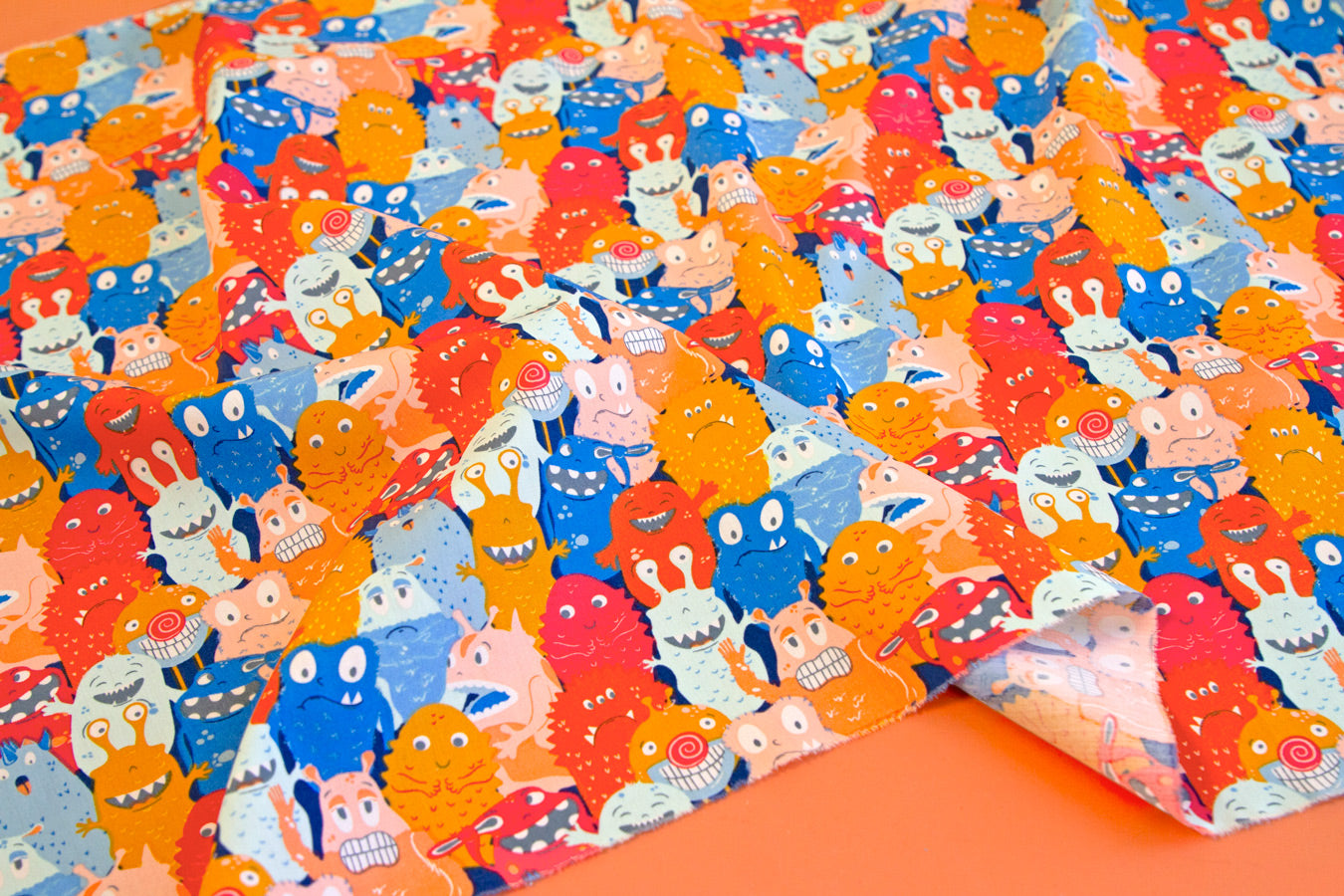 a close up of a colorful cloth with animals on it