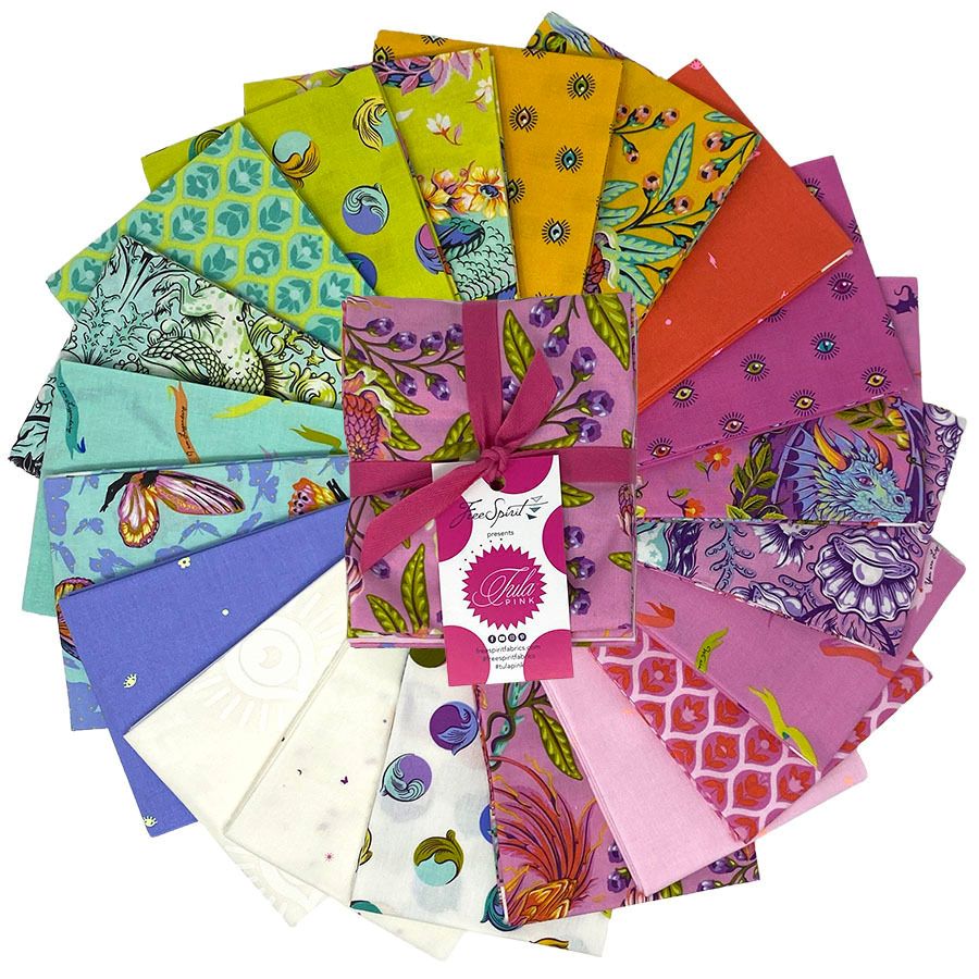 a circular arrangement of various colorful fabric pieces, each with unique patterns and designs.