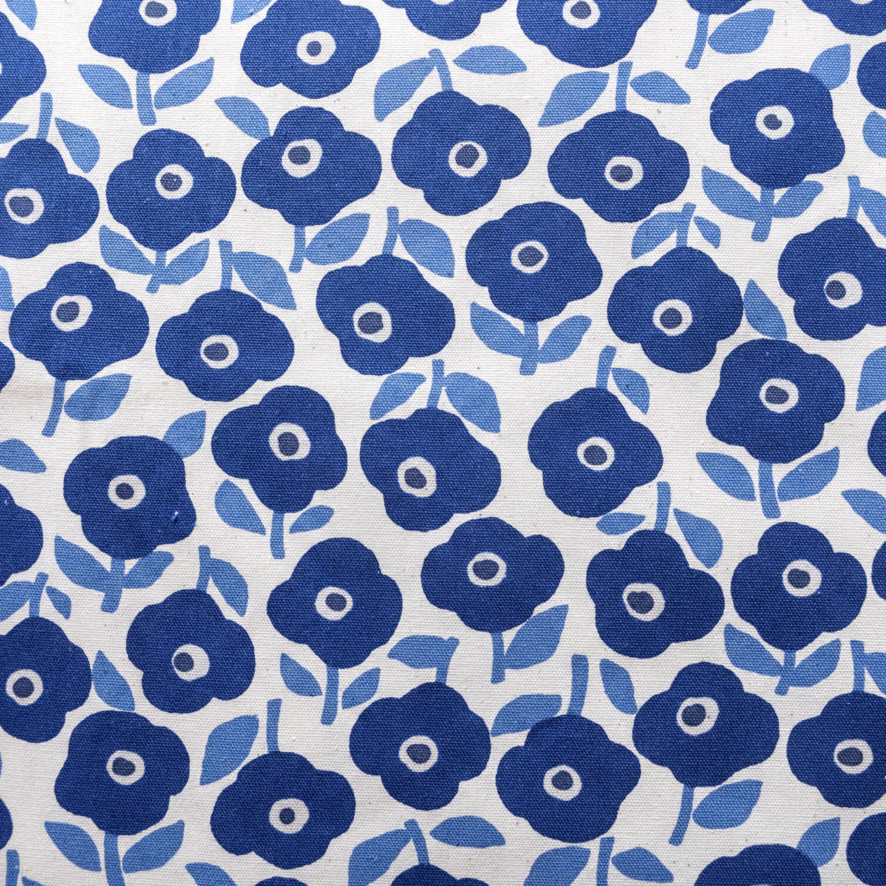 a repeating pattern of blue flowers with white centers and green leaves on a white background.