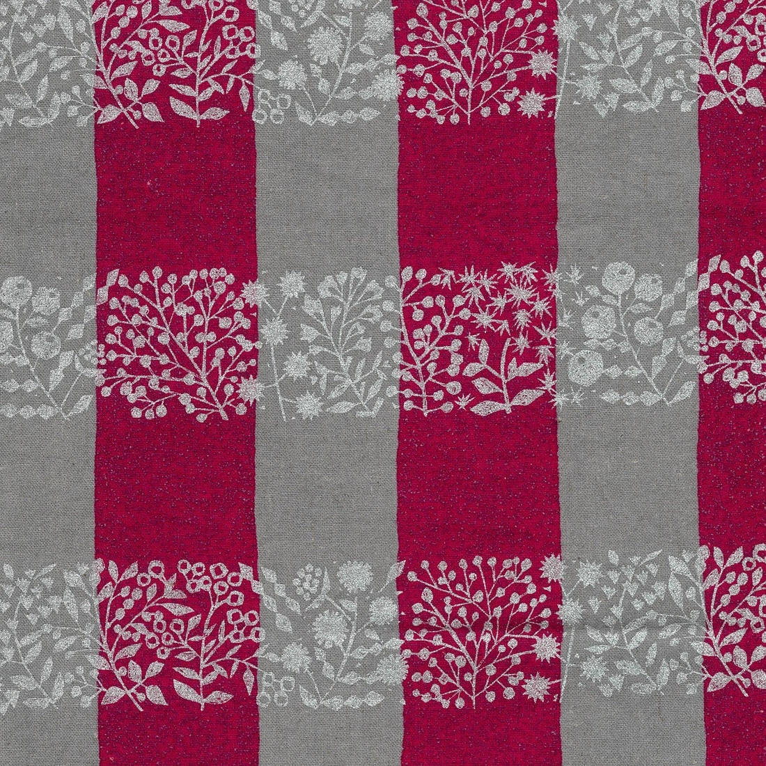 a repeating pattern of red and gray stripes with white floral designs on them.