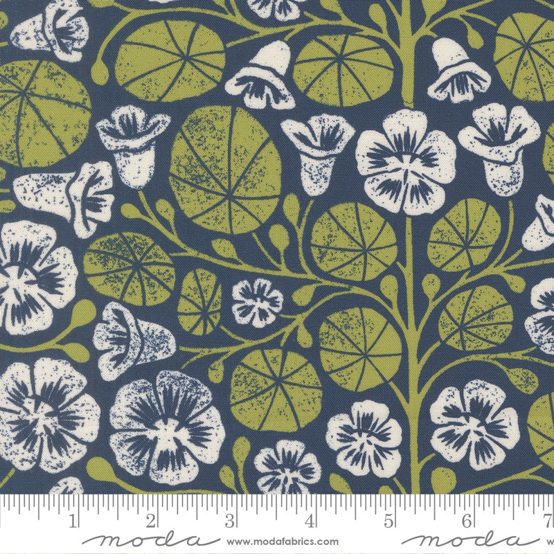 a repeating pattern of stylized flowers and leaves in shades of green and white against a dark blue background.