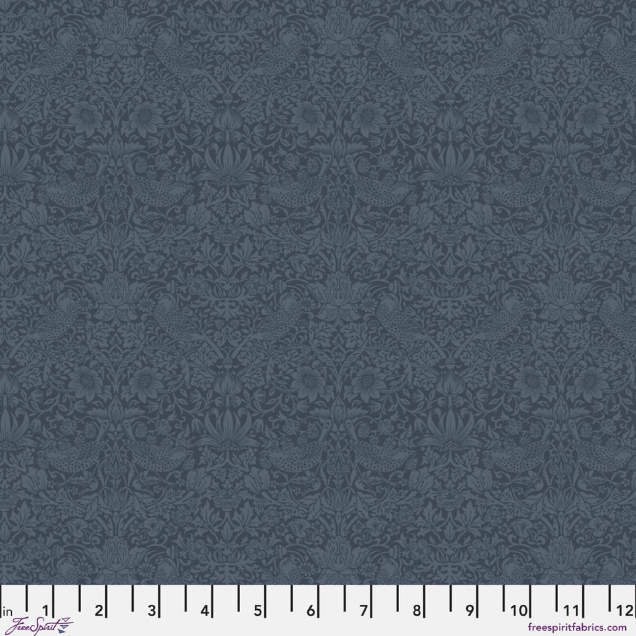 The image is a repeating pattern of a dark blue floral design, with a ruler at the bottom indicating the size of the pattern in inches.