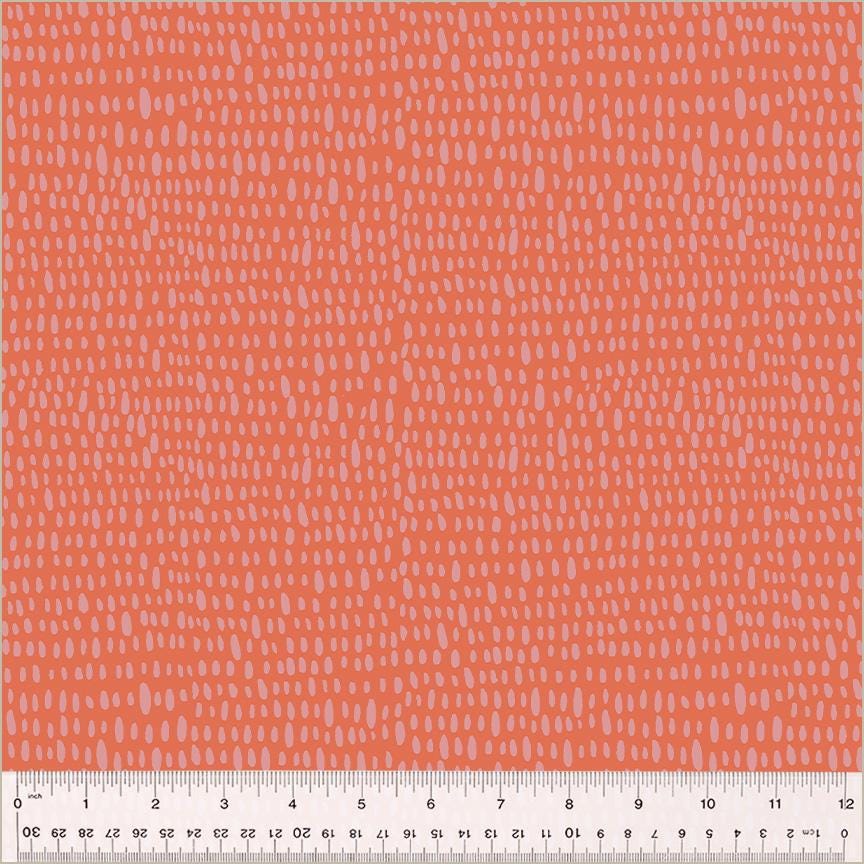 a ruler with an orange background